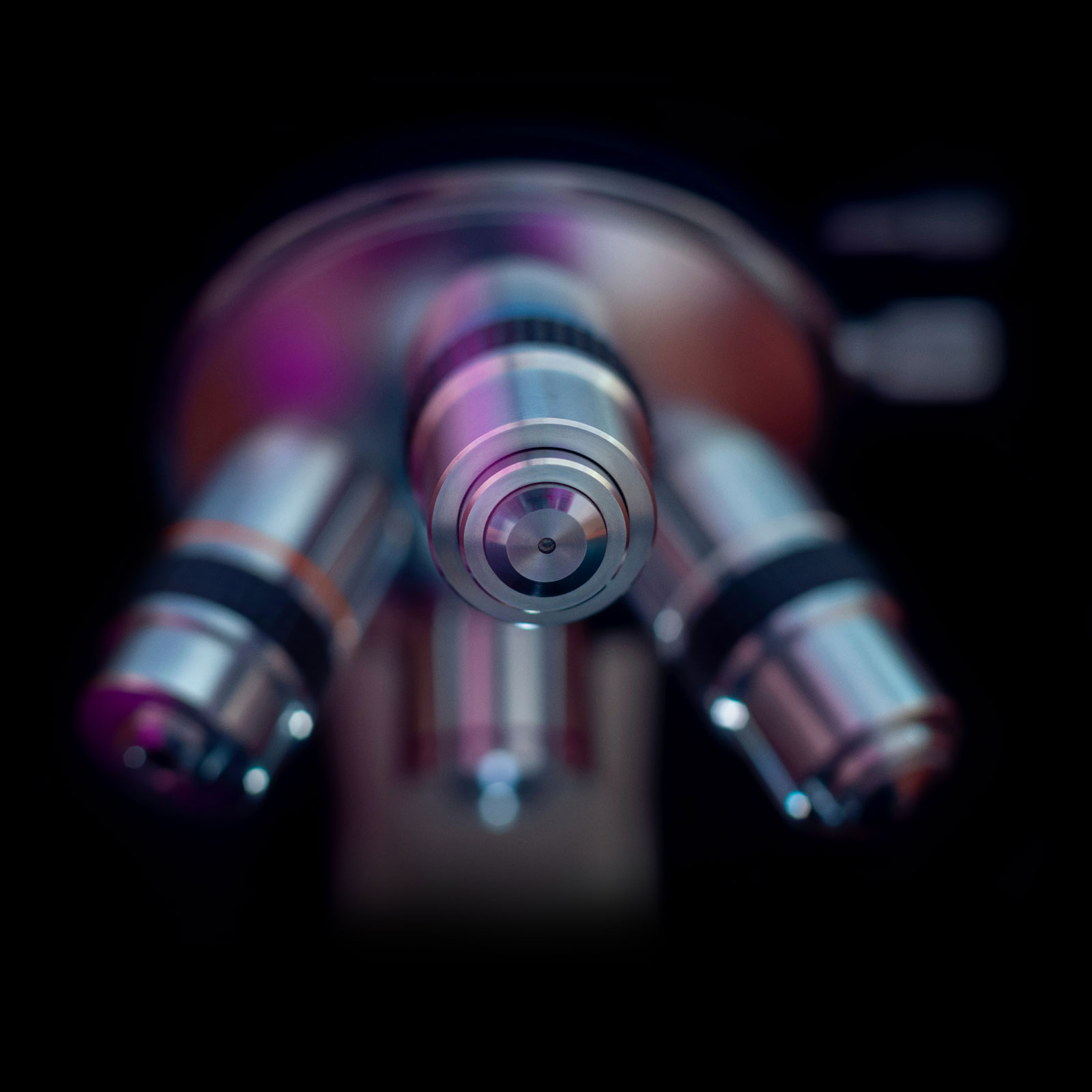 Close up of a microscope turret objective