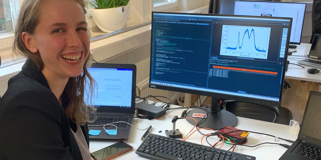 An Eclipse colleague working with optics